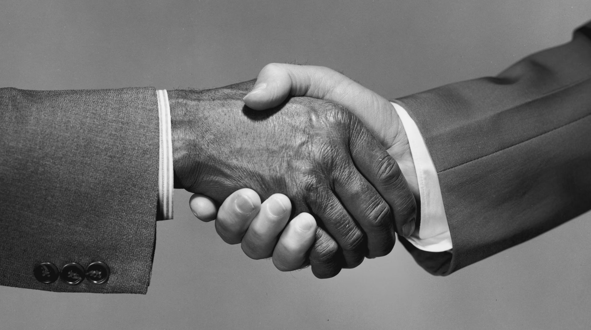 Professional handshake in black and white